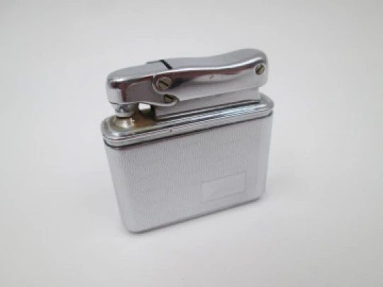 Colibri MonoGas pocket lighter. Silver plated. Geometric pattern. West Germany. 1950's