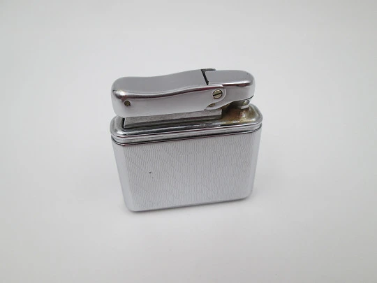 Colibri MonoGas pocket lighter. Silver plated. Geometric pattern. West Germany. 1950's