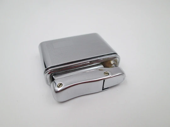 Colibri MonoGas pocket lighter. Silver plated. Geometric pattern. West Germany. 1950's