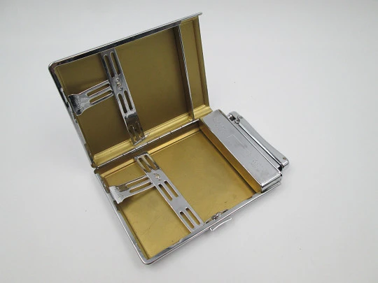 Colibri Monopol cigarette case and lighter. Silver plated metal. Petrol. UK map. 1960's