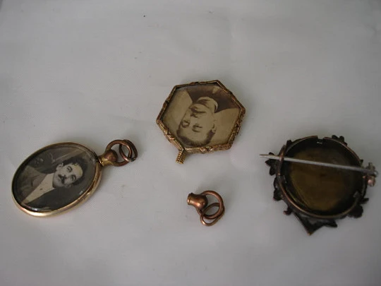 Collection of three antique photo frame pendants. Gold and silver metal. 1910's