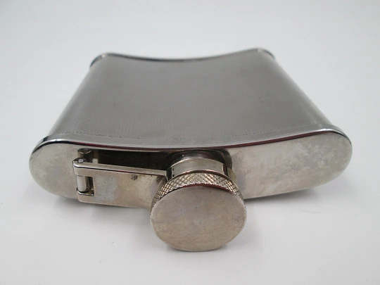 Collection three men's hip flasks. Stainless steel and leather. 1980's