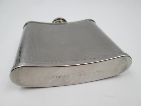 Collection three men's hip flasks. Stainless steel and leather. 1980's