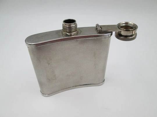 Collection three men's hip flasks. Stainless steel and leather. 1980's