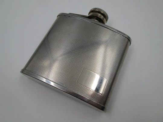 Collection three men's hip flasks. Stainless steel and leather. 1980's