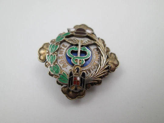 Commercial agent lapel emblem. Sterling silver and colours enamel. 1950's. Spain