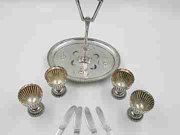 Conjunto hueveras con soporte. Metal plateado. Christofle y Travis Wilson