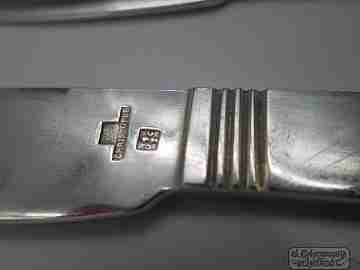Conjunto hueveras con soporte. Metal plateado. Christofle y Travis Wilson