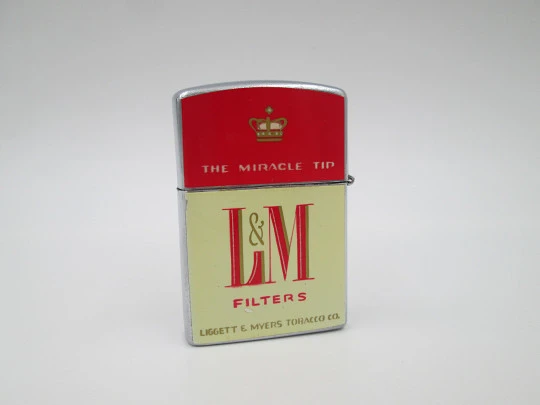 Continental petrol pocket lighter. LM cigarettes. Chromed metal. Box & instructions