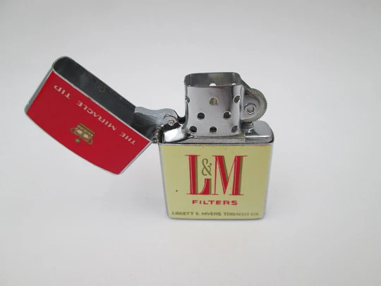 Continental petrol pocket lighter. LM cigarettes. Chromed metal. Box & instructions