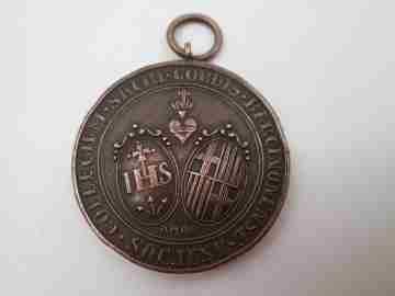 Copper medal. Sacred Heart School Barcelona. Handle and ring on top. 1950's. Spain