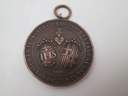 Copper medal. Sacred Heart School Barcelona. Handle and ring on top. 1950's. Spain