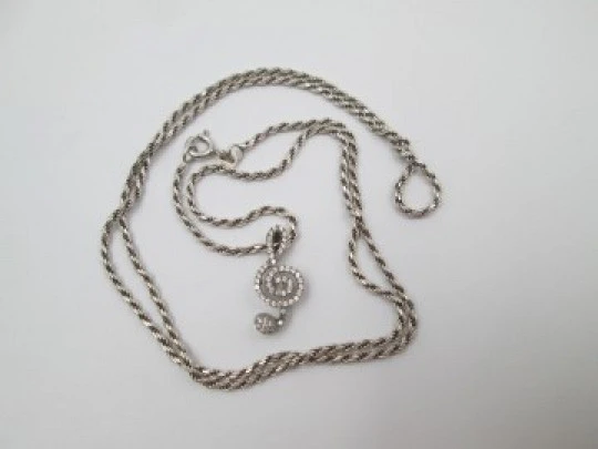 Cord with musical note pendant. 925 sterling silver and white gems. 1990's