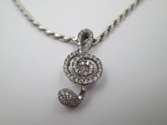 Cord with musical note pendant. 925 sterling silver and white gems. 1990's