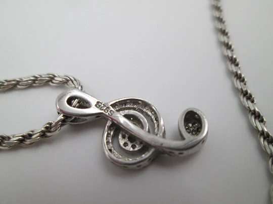 Cord with musical note pendant. 925 sterling silver and white gems. 1990's