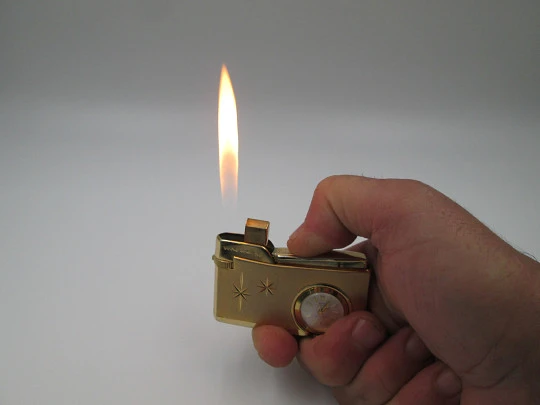 Cordial 33 butane lighter with Fero mechanical watch. Gold plated netal. 1960's. Swiss