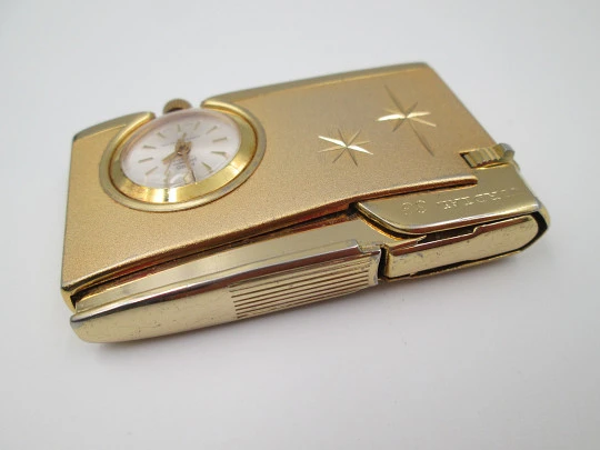 Cordial 33 butane lighter with Fero mechanical watch. Gold plated netal. 1960's. Swiss