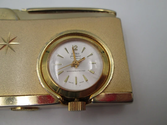 Cordial 33 butane lighter with Fero mechanical watch. Gold plated netal. 1960's. Swiss