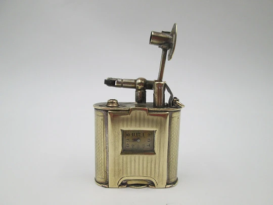 Corona petrol lighter with Atlantic wind-up watch. Golden plated. Germany / Swiss. 1940's Corona petrol lighter with Atlantic wind-up watch. Golden plated. Germany / Swiss. 1940's