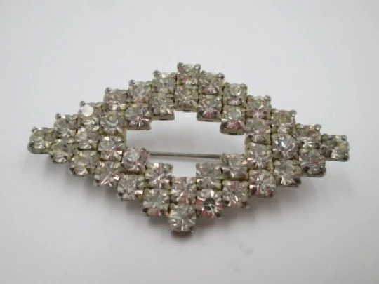 Costume jewelry brooch. Silver metal & rhinestones. Rhombus shape. 1960's