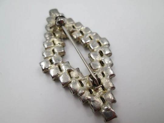 Costume jewelry brooch. Silver metal & rhinestones. Rhombus shape. 1960's