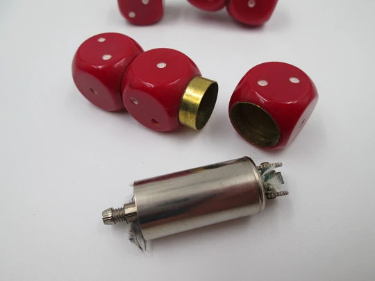 Couple dice lighters. Red plastic and golden metal. Germany. 1970