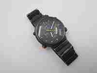 Cronógrafo cuarzo Seiko Sport 100. Metal pavonado negro y acero. Brazalete. 1980