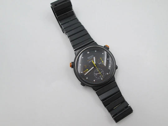 Cronógrafo cuarzo Seiko Sport 100. Metal pavonado negro y acero. Brazalete. 1980