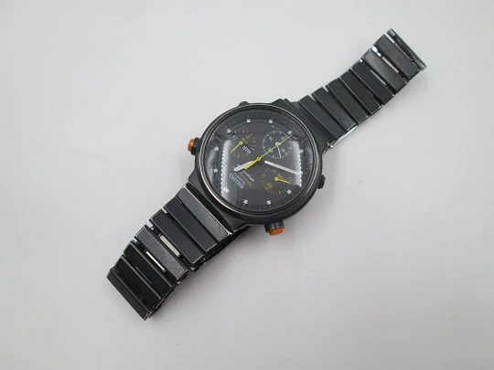 Cronógrafo cuarzo Seiko Sport 100. Metal pavonado negro y acero. Brazalete. 1980