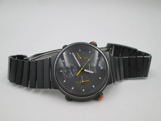 Cronógrafo cuarzo Seiko Sport 100. Metal pavonado negro y acero. Brazalete. 1980