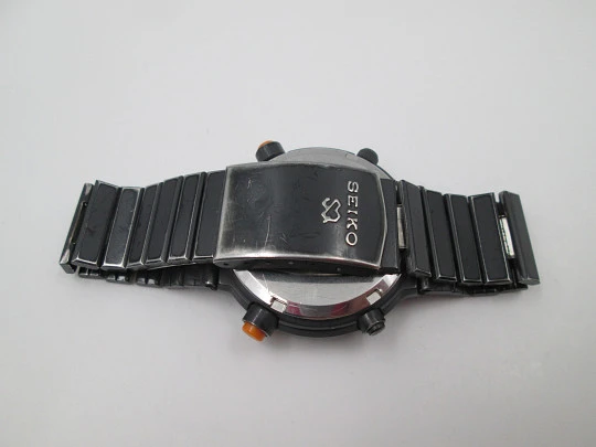 Cronógrafo cuarzo Seiko Sport 100. Metal pavonado negro y acero. Brazalete. 1980