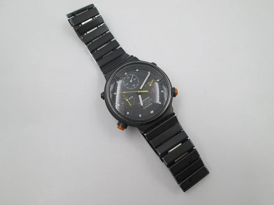 Cronógrafo cuarzo Seiko Sport 100. Metal pavonado negro y acero. Brazalete. 1980