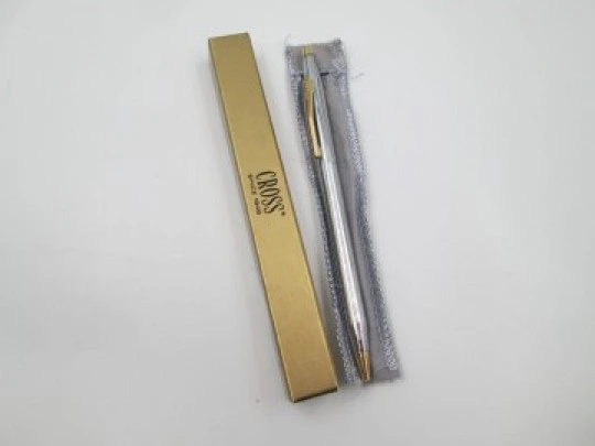 Cross Century Classic ballpoint pen. Chromed metal and gold plated. Original box. USA