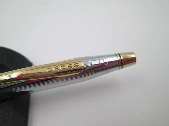 Cross Century Classic ballpoint pen. Chromed metal and gold plated. Original box. USA