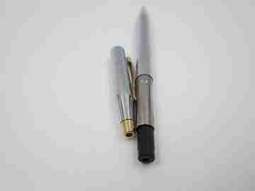 Cross Century Classic ballpoint pen. Chromed metal and gold plated. Original box. USA