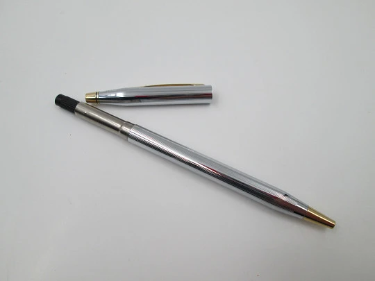 Cross Century Classic ballpoint pen. Chromed metal and gold plated. Original box. USA