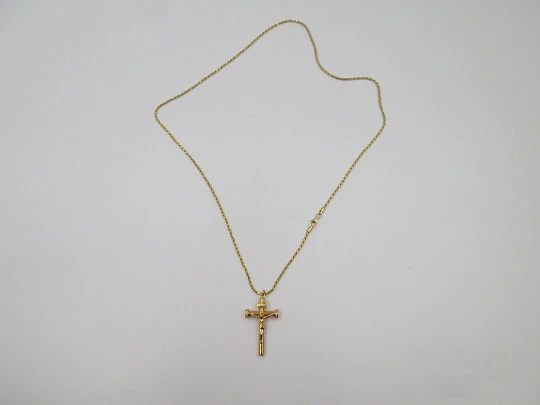 Crucifix pendant with braided cord. Golden sterling silver & white gems. 1980's. Europe