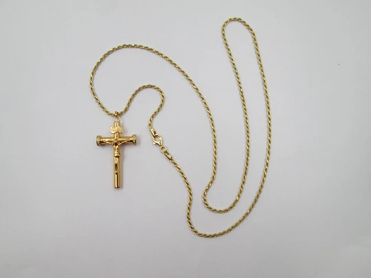 Crucifix pendant with braided cord. Golden sterling silver & white gems. 1980's. Europe