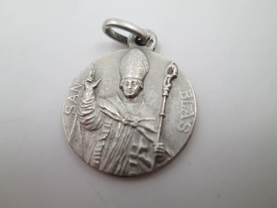 Cuatro medallas religiosas plata de ley. Santos, Jesús y Virgen. 1960