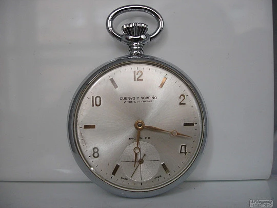 Cuervo & Sobrinos. Open-face. Silver plated metal. Arabic numerals