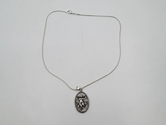 Cupid openwork oval pendant with cord. 925 sterling silver. Carabiner clasp. 1980's. Europe