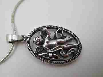 Cupid openwork oval pendant with cord. 925 sterling silver. Carabiner clasp. 1980's. Europe