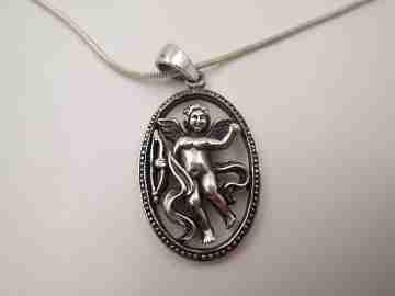 Cupid openwork oval pendant with cord. 925 sterling silver. Carabiner clasp. 1980's. Europe