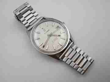 Cyma Navystar. Automático. Acero inoxidable. Calendario. Brazalete. 1960