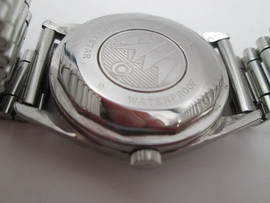 Cyma Navystar. Automático. Acero inoxidable. Calendario. Brazalete. 1960