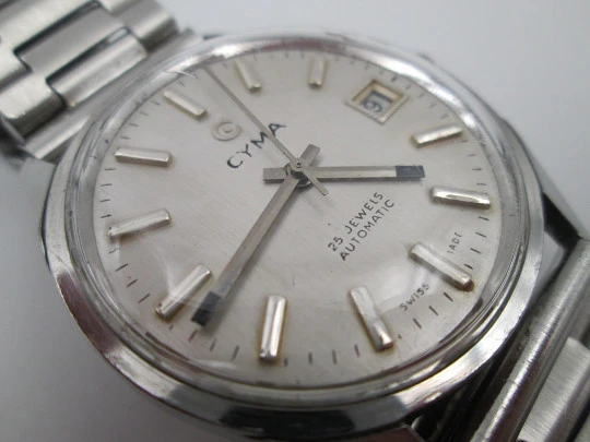 Cyma Navystar. Automático. Acero inoxidable. Calendario. Brazalete. 1960