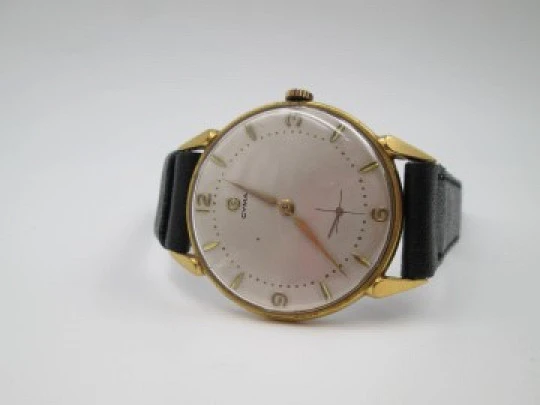 Cyma Tavannes. 10 microns gold plated and steel. Manual wind. 1950's. Swiss