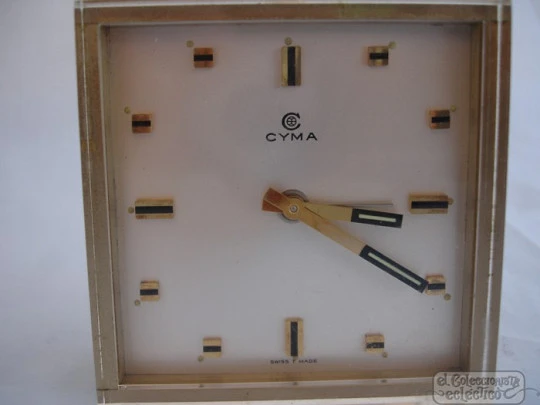 Cyma. Swiss. Methacrylate and bronze. 1950's. Alarm. Wind-up