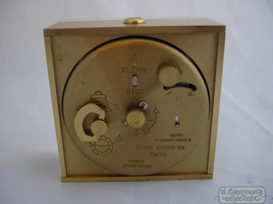 Cyma. Swiss. Methacrylate and bronze. 1950's. Alarm. Wind-up