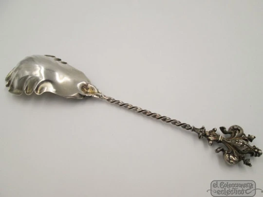 Decorative silver and vermeil spoon. 19th century. France